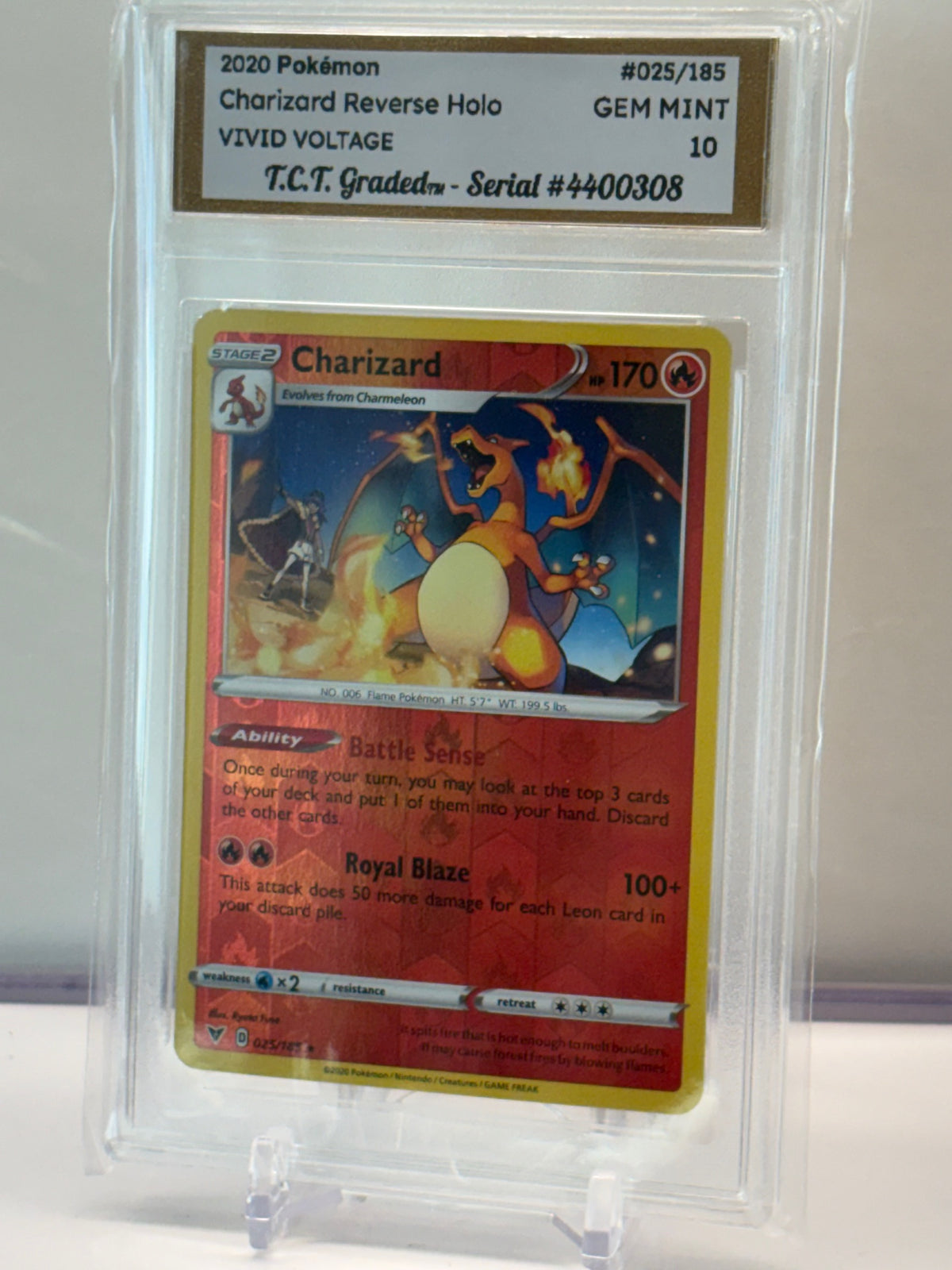 Authentic 2020 Pokémon #025/185 Charizard reverse Holo Vivid Voltage TCT Graded Gem Mint 10 card stand included